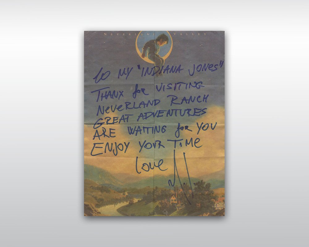 MICHAEL JACKSON INSCRIBED NEVERLAND STATIONARY: Rare personal Neverland Valley Ranch stationary inscribed by Michael Jackson in black ink "To my 'Indiana Jones' / Thanx for visiting / Neverland Ranch / great adventures / are waiting for you / Enjoy