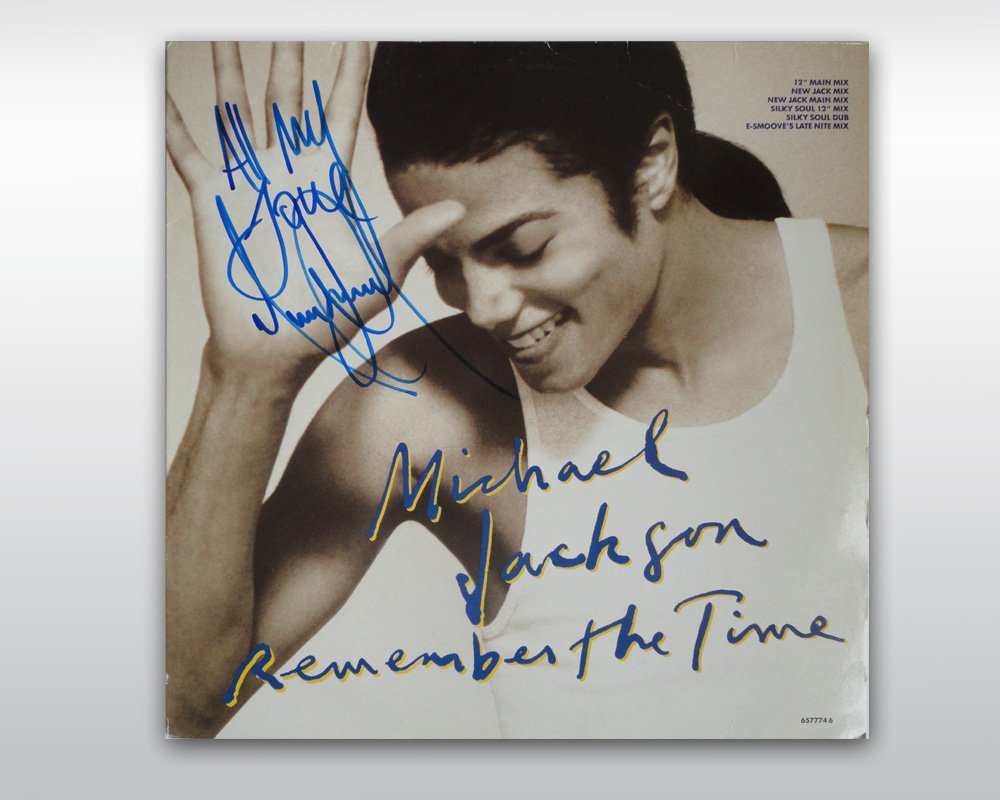 MICHAEL JACKSON SIGNED REMEMBER THE TIME SINGLE: Michael Jackson signed 'Remember The Time' single LP from 1991. The King of Pop personally signed the left top corner of the record sleeve in blue felt ink "All My Love Michael Jackson". (31 x 31 cm) 