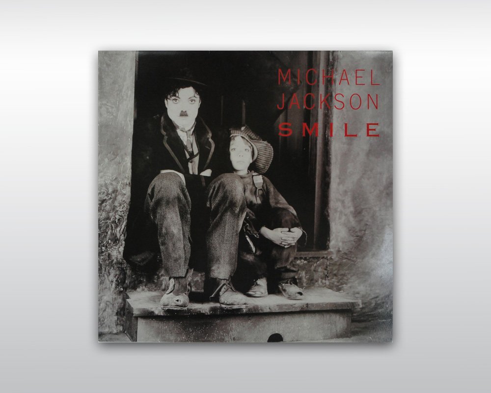 MICHAEL JACKSON RARE 12-INCH SMILE SINGLE: Very rare hard to find Michael Jackson 'Smile' 12-inch single record with Michael Jackson dressed as Charlie Chaplin on the cover. Never released, only a handful copy saved. Unsigned but in exremely g