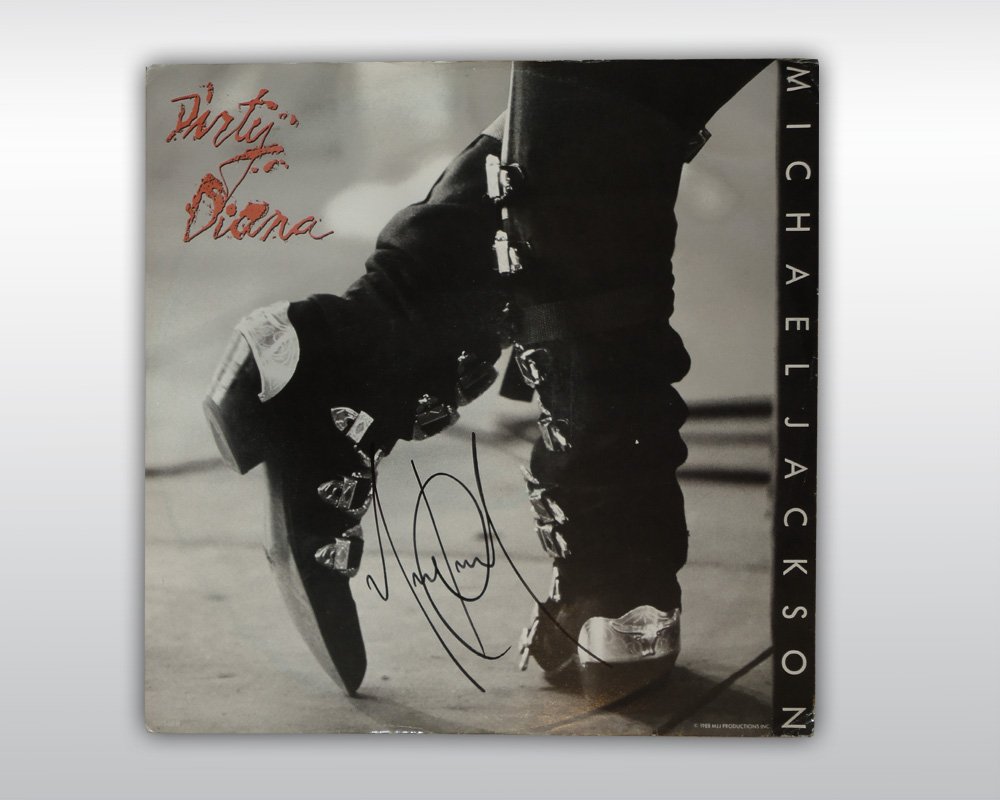 MICHAEL JACKSON SIGNED DIRTY DIANA SINGLE: An original copy of the LP single 'Dirty Diana' released by Epic Records on April 18, 1988 as the fifth single from the 'Bad' album. EPIC Records EPC 651546 8. The front of the record cover is signed 