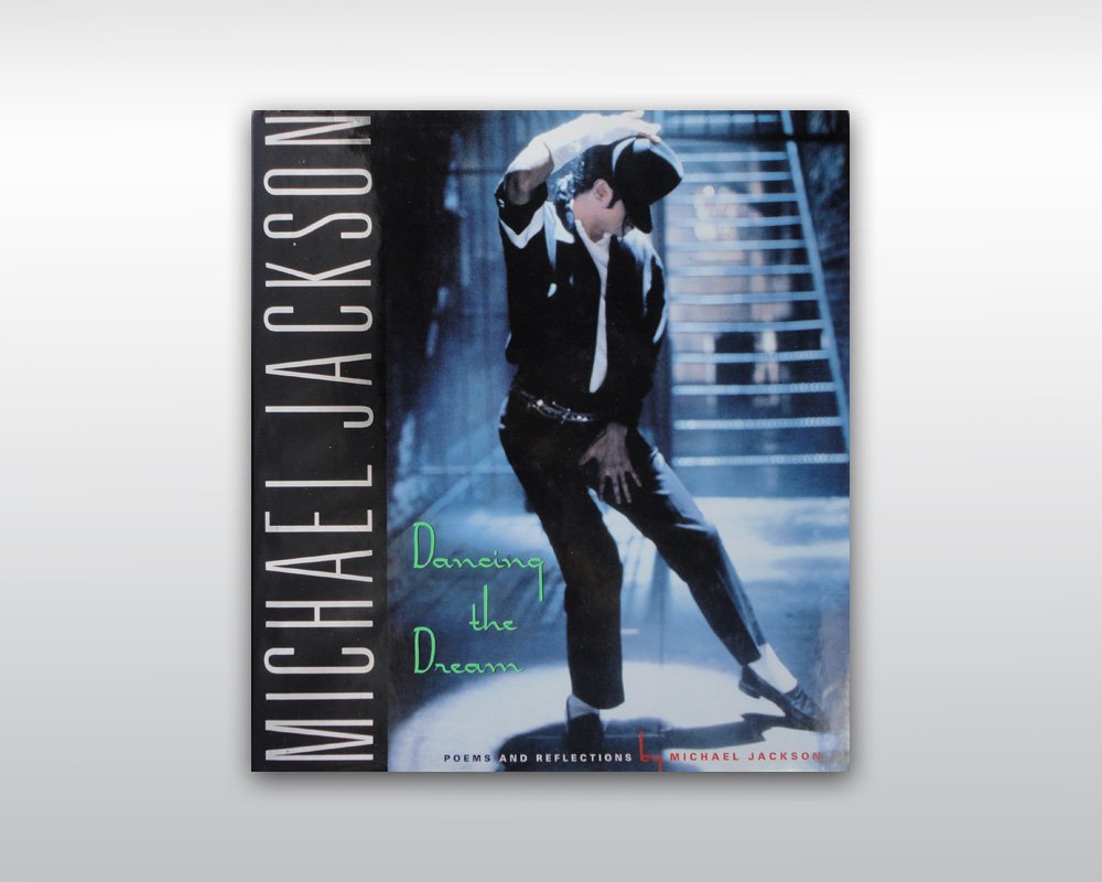 MICHAEL JACKSON SIGNED DANCING THE DREAM BOOK: Signed Michael Jackson 'Dancing The Dream' book from 1992. Signed in black ink inside of the book. Publisher: Doubleday, first edition, printed in Germany. Estimated $800-1,000.