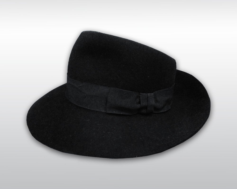 MICHAEL JACKSON WORN BLACK FEDORA HAT: An amazin black felt fedora hat owned and worn by Michael Jackson during his HIStory World Tour. Michael Jackson threw this hat to the public at the end of the song "Billie Jean" in Amsterdam, Netherl