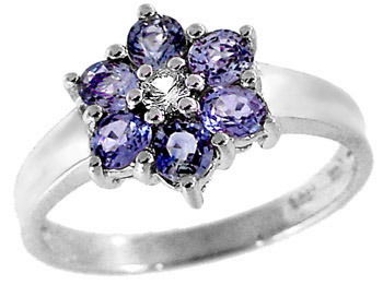WG 1.15ct Sapphire & white Sapphire flower ring: LOW LOW BUYERS PREMIUM (10% upto $499, 8% for $500 and up) NO RESERVE AUCTION! BIDDING STARTS AT $10! This elegant ring features bright clean pastel baby blue Sapphires set in a flower motif with a W