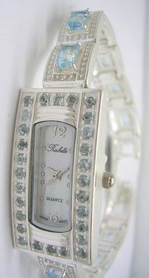 SSilver 12.75ct BlueTopaz Rochelle Ladies Square: LOW BUYERS PREMIUM (10%) NO RESERVE AUCTION! BIDDING STARTS AT $10! This beautiful and trendy Ladies 12.75carats total weight of Blue Topaz timepiece is exclusively designed by Jeremiahs International