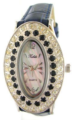 SS Sapphire White Topaz Rochelle Blue Band Watch: LOW BUYERS PREMIUM (10%) NO RESERVE AUCTION! BIDDING STARTS AT $10! This beautiful and trendy Ladies Sapphire and White Topaz timepiece is exclusively designed by Jeremiahs International named Rachell