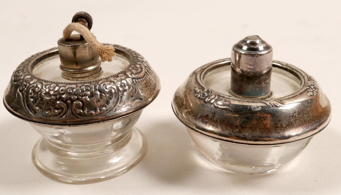 Sterling Table Lighters / 2 Items (102084): Here we have a beautiful pair of table lighters. They we made by Frank M. Whiting which was founded in 1878. His company was well known , for all different type of Sterling silver items. Item #1 of 2