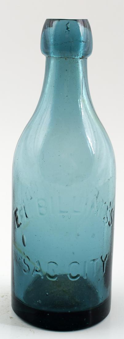 E. L. BILLING'S SODA BOTTLE (30477): Geyser Soda ( au ) / Reverse: E. L Billings (au) / Sac City // Light teal blue. Clean and shiny. Has a 3/8" inside lip bruise. Otherwise , a nice bottle with an olive swirl in it, towards the base.(RH