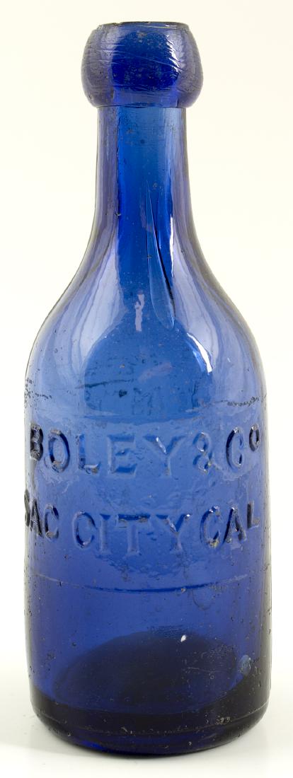 Pontiled California Gold Rush Sodas: Boley & Co: Boley & Co / Sac City Cal //. Medium cobalt blue. Pro cleaned, with light wear and minor pitting remaining. But, there is a 3/8" inside lip bruise. Very nice.., 1" x 1/4" elongated tear drop bubble in