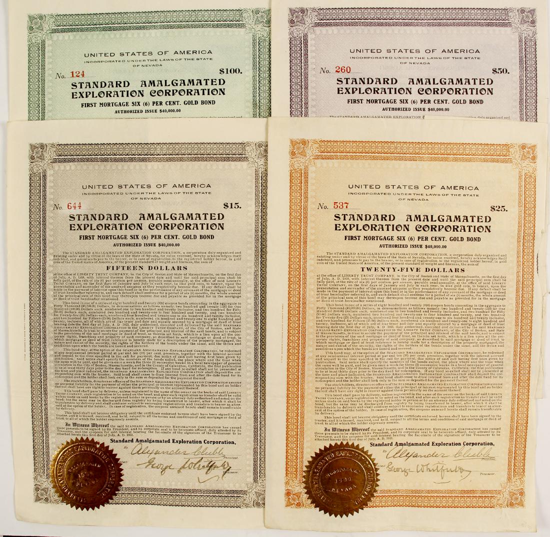 Standard Amalgamated Bonds (3), Calaveras4 (88850): Four issued bonds for the Standard Amalgamated Exploration Co. $15 (brown), $25 (orange), $50 (blue), $100 (green), all signed by Alexander Cluble as president and George Whitfield as Treasurer. The b
