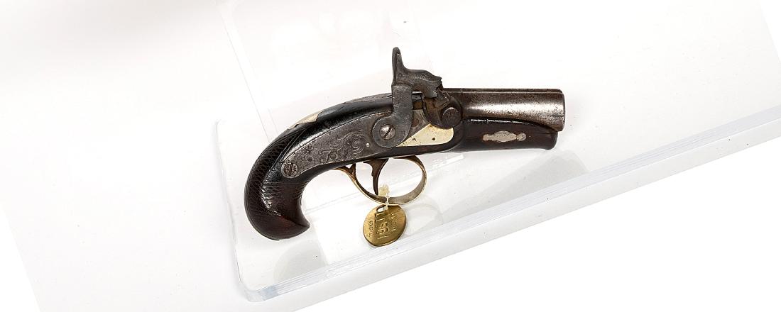 Philadelphia Pistol 1850s JMD-11218: This is a derringer pocket pistol marked "Philadelphia" in .40 cal. 2-in. barrel with a German silver inlay on the escutcheon side. SN: N/A, JMD Oval Tag: 11561, Condition: Excellent, >