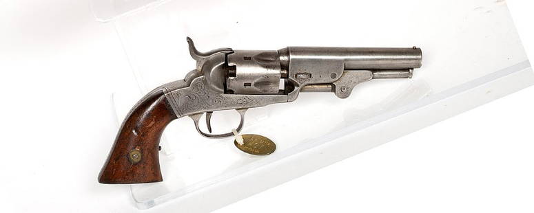 Baron Manufacturer and Co Revolver 1860's JMD-11265: This is a Baron Manufacturer and Co revolver with a 4 in. barrel. Nickel finish engraved. fluted cylinder, round barrel, and wood grips, good condition. SN: N/A, JMD Oval Tag: 407, Condition: Good, >