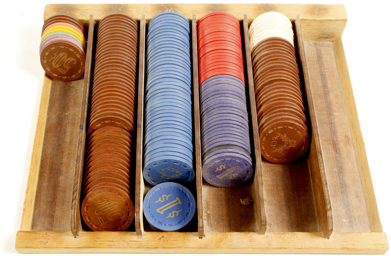 Elks Lodge Poker Chips #81327: A rack of Fresno Elks lodge #445 and #439 poker chips in a wooden rack. Approximately 120 chips, different denominations: 50c, $1, $5. Daniel Manassillian Collection. State: California City: Fresno Da