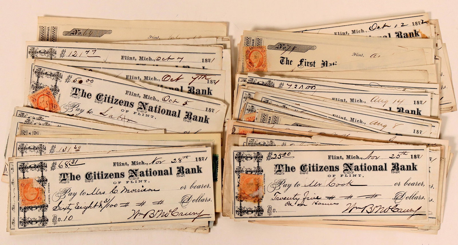 Michigan Bank Checks with Revenue Stamps (112109): Lot of 97 checks, mostly The Citizens National Bank of Flint, from the 1860s-1870s, almost all with revenue stamps. Also the First National Bank of Flint, and W. Paterson checks. Provenance: Country (