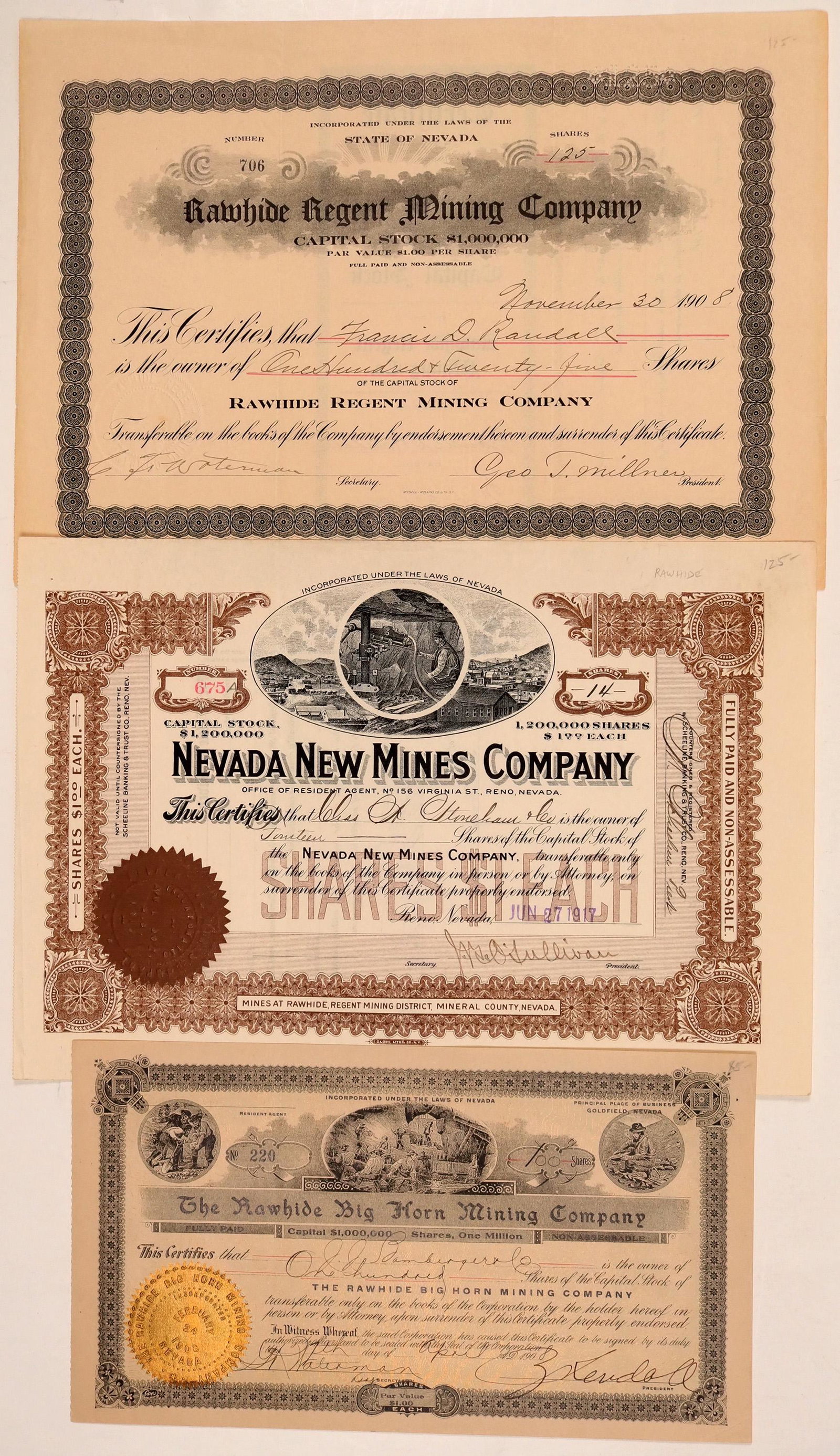 Rawhide Stock Certificates Trio (110823): Lot of 3: first is the Rawhide Big Horn Mining Co. certificate, signed by president Zeb Kendall, is a rare find. This also has 3 beautiful vignettes. There is the Rawhide Regent Mining Co. and the Nev