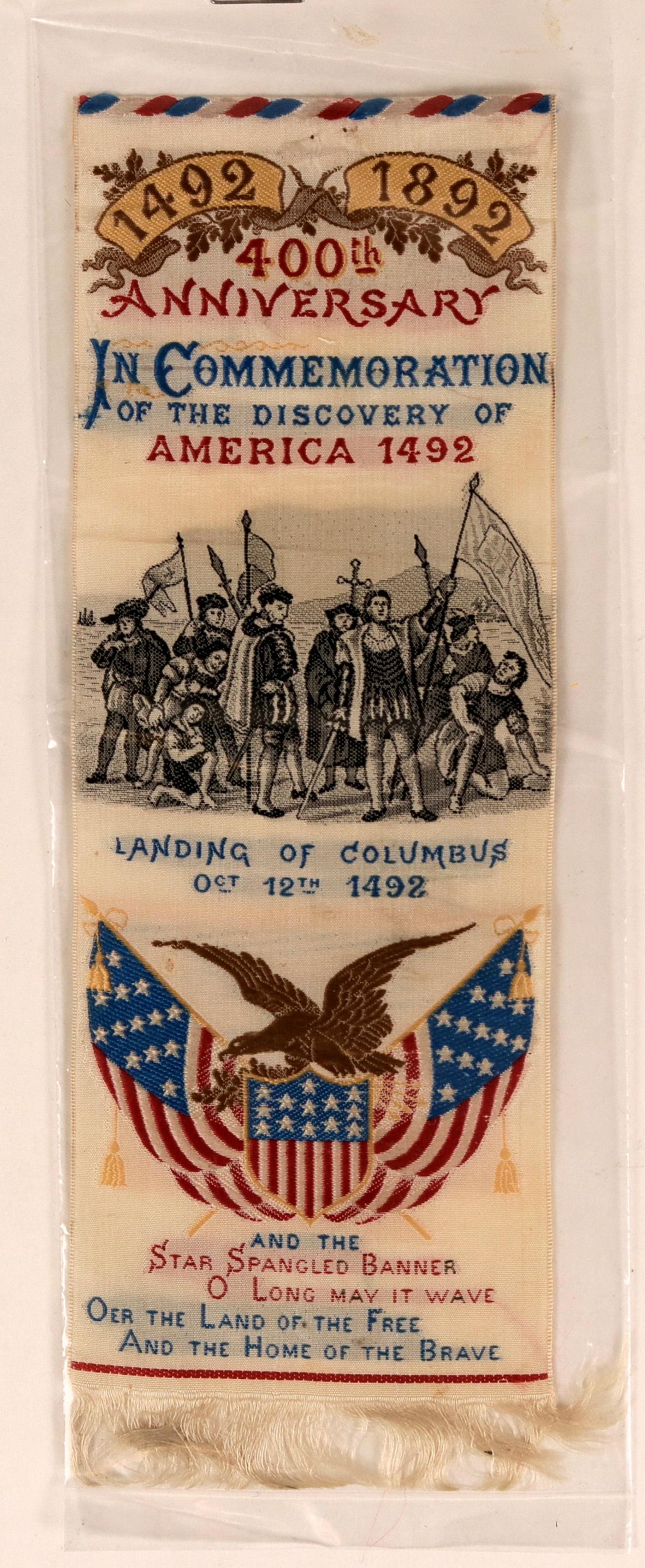 400th Anniversary of Columbus Landing Ribbon (113247): Likely a Columbian Exposition piece. Gorgeous color ribbon with red, white, blue, and gold stitching and silver tassels. Made by JJ Mannion, Chicago, Illinois. "In Commemoration of the Discovery of Am