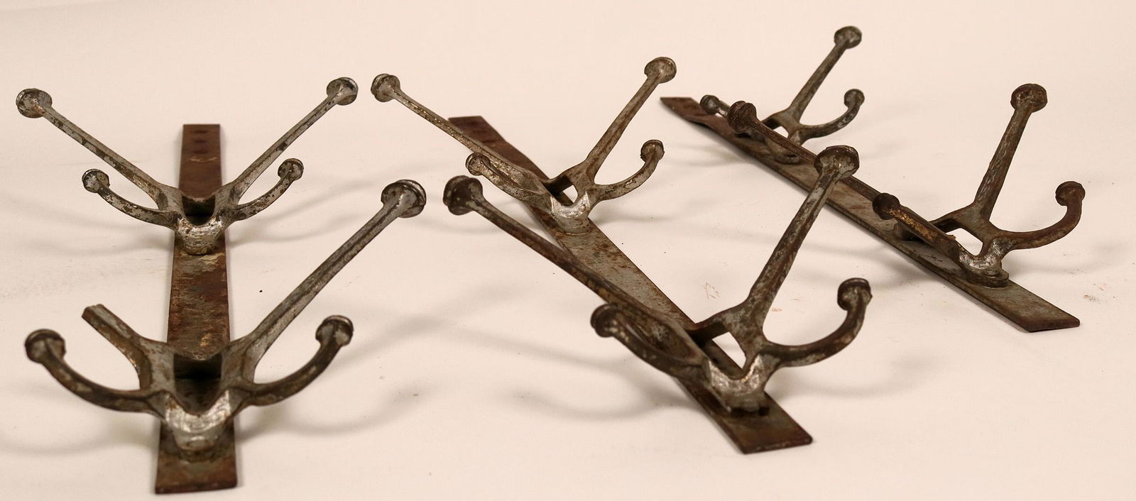 Old Saloon Hat & Coat Racks (118127): Three still functional wall coat or hat hanging hooks ready for you 10 gallon hat, bwoler or frock coat. There are three separate hangers with four hanging hooks on each. There is damage to one of the