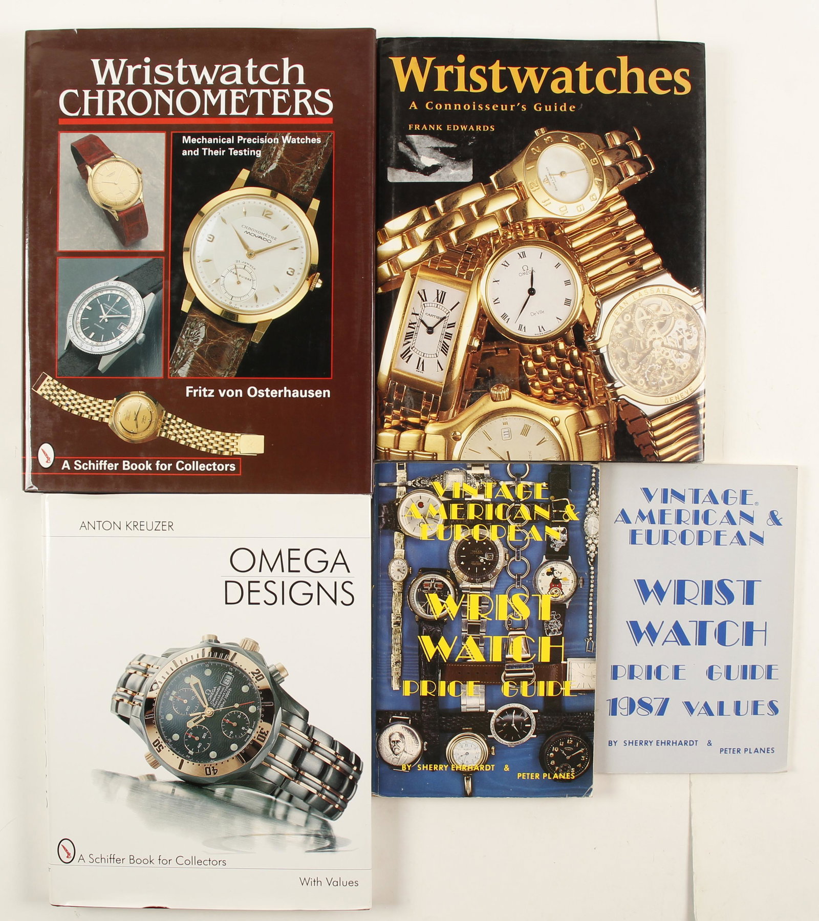 Wristwatch Reference Library (4) (76951): 4 watch books. Omega Designs by Kreuzer, Wristwatches by Erhardt, Wristwatches a Connoisseur's Guide by Edwards, Wristwatch Chronometers by Osterhausen.Provenance: Country (if not USA): State: City/Co