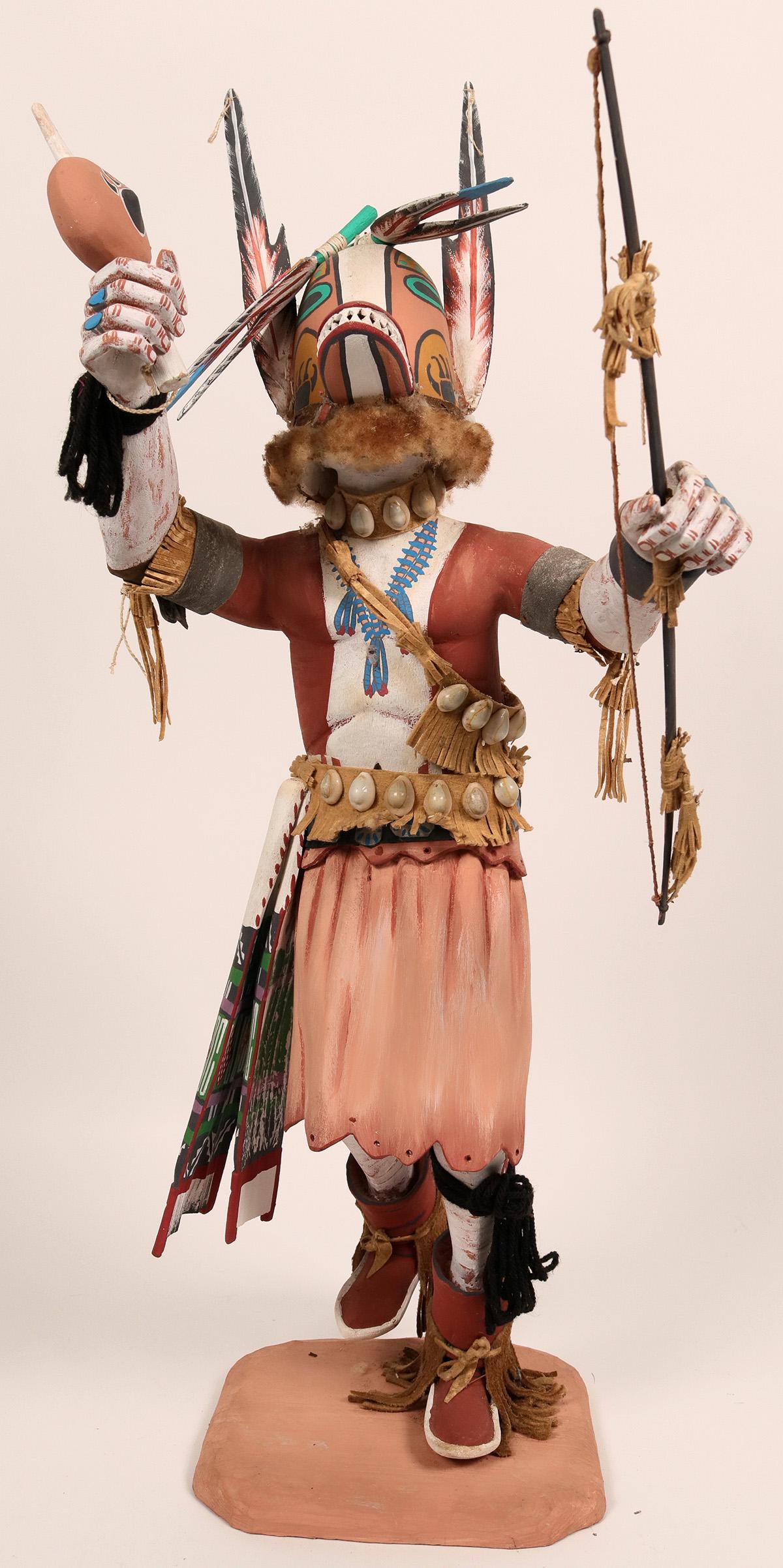 Badger Kachina (120966): Navajo Badger Kachina, hand painted with shells, leather, fur,etc. 30.5" x 16" x 12". Some fur damage, but in good condition otherwise.Date: Country if not USA: State: ArizonaCity: NavajoProvenance: