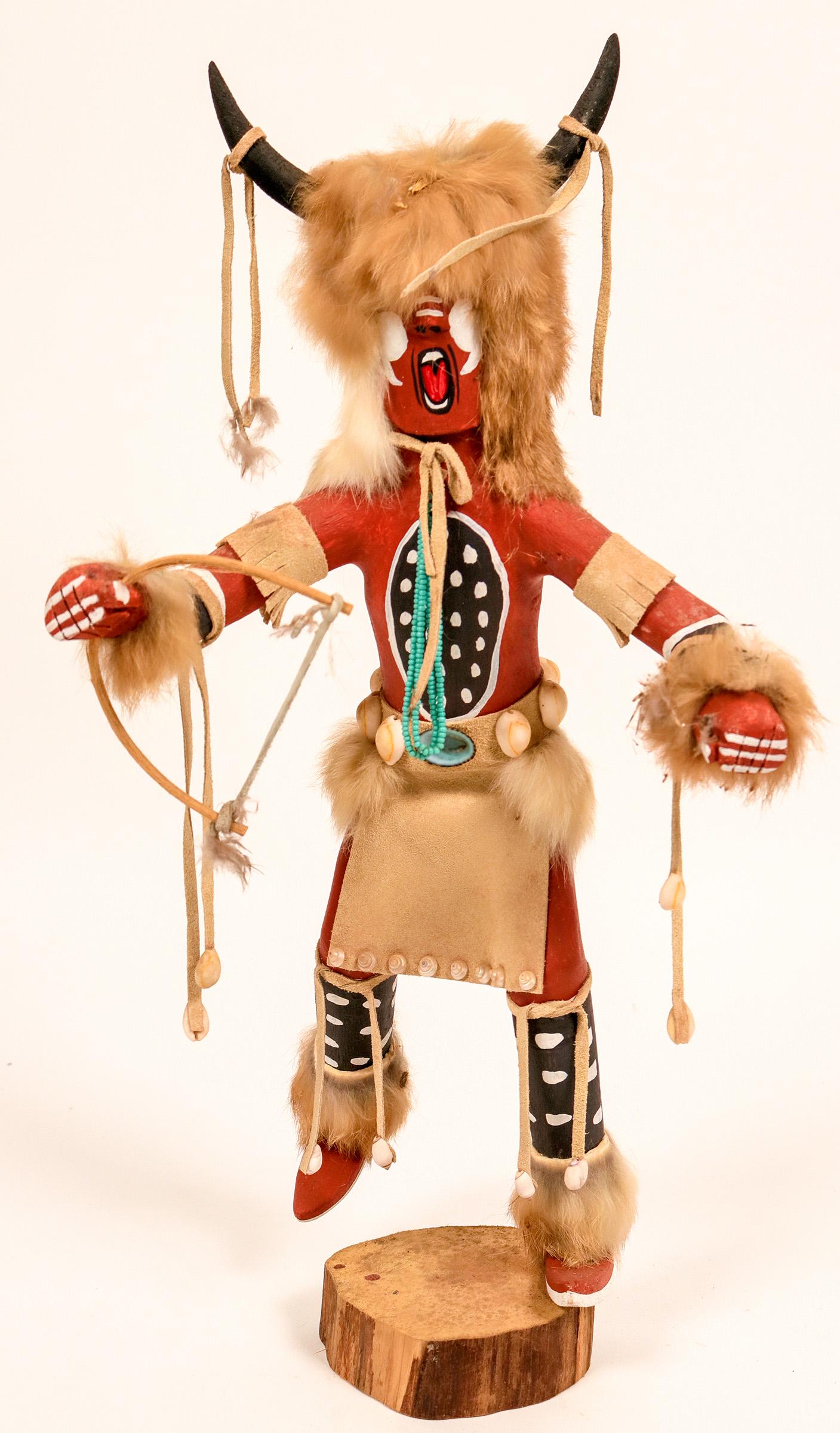 Brown Buffalo Dancer Kachina (120971): Brown Buffalo Kachina by N, Smith. 17.5" x 9" x 7". Hand painted with shells, fur, etc. Some fur damage, fair condition.Date: Country if not USA: State: ArizonaCity: NavajoProvenance: