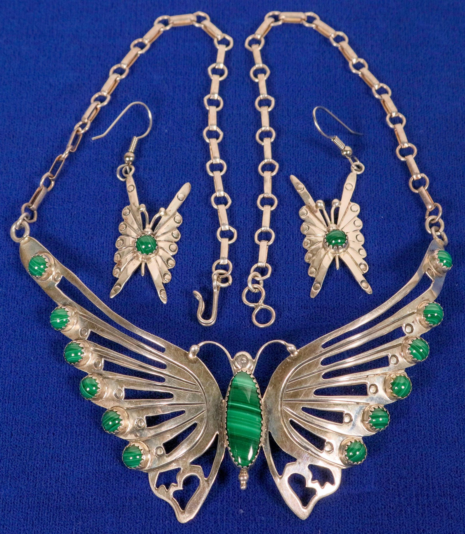 Malachite Butterfly Necklace Set (120597): This is a beautifully crafted Malachite butterfly necklace set by Navajo artist Sarah Dickens, both necklace and earrings are signed S. Dickens, butterfly wing spand is four inched at the top and meas