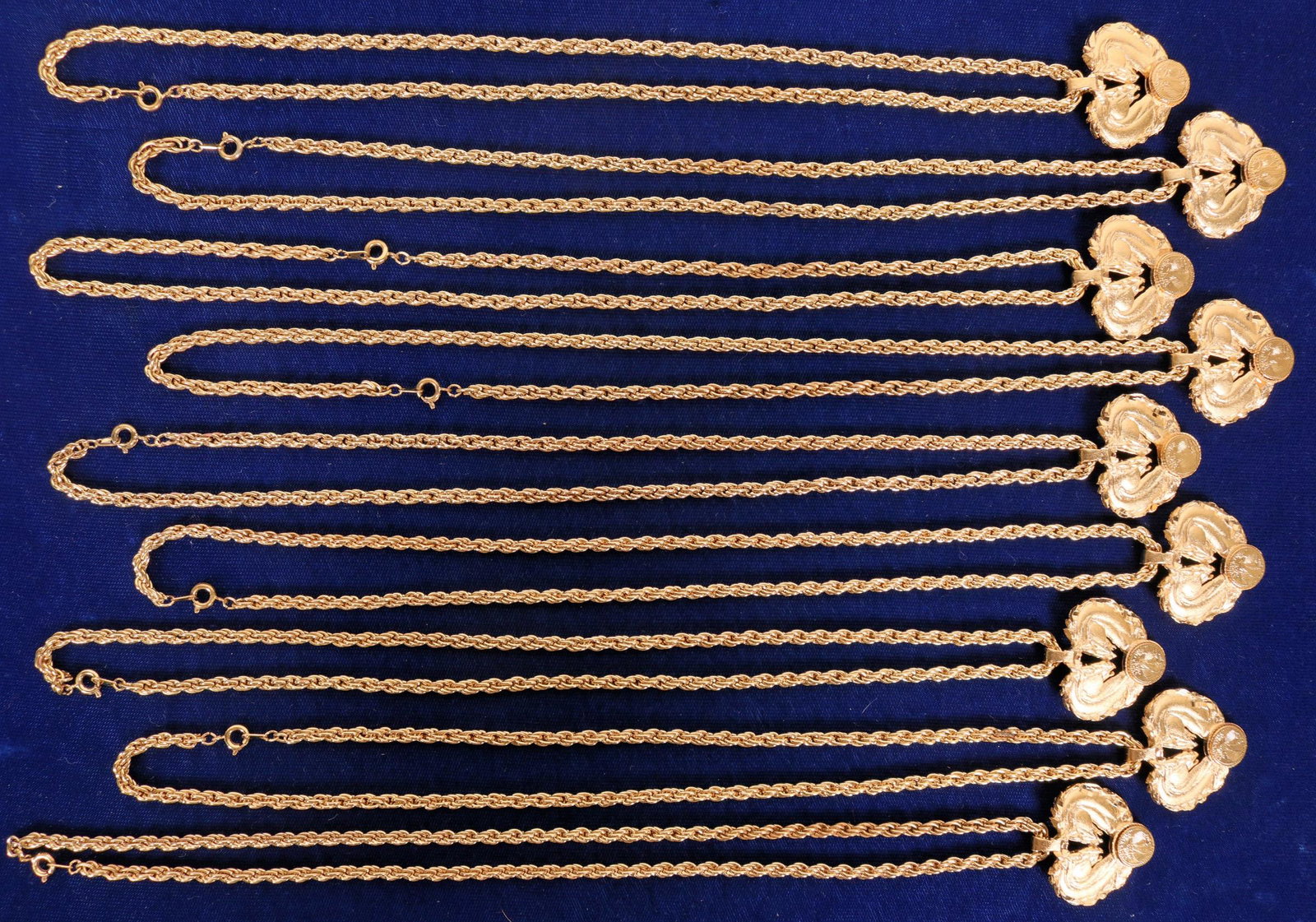 Jewelry / Double Horse Head w/Coin Necklaces / 9 Items: Here is a really nice grouping of necklaces. The " Double Horse Head" is a very old standard , dating back to Medieval Times. This standard, has the addition of a coin, resembling a U.S Coin, but ther