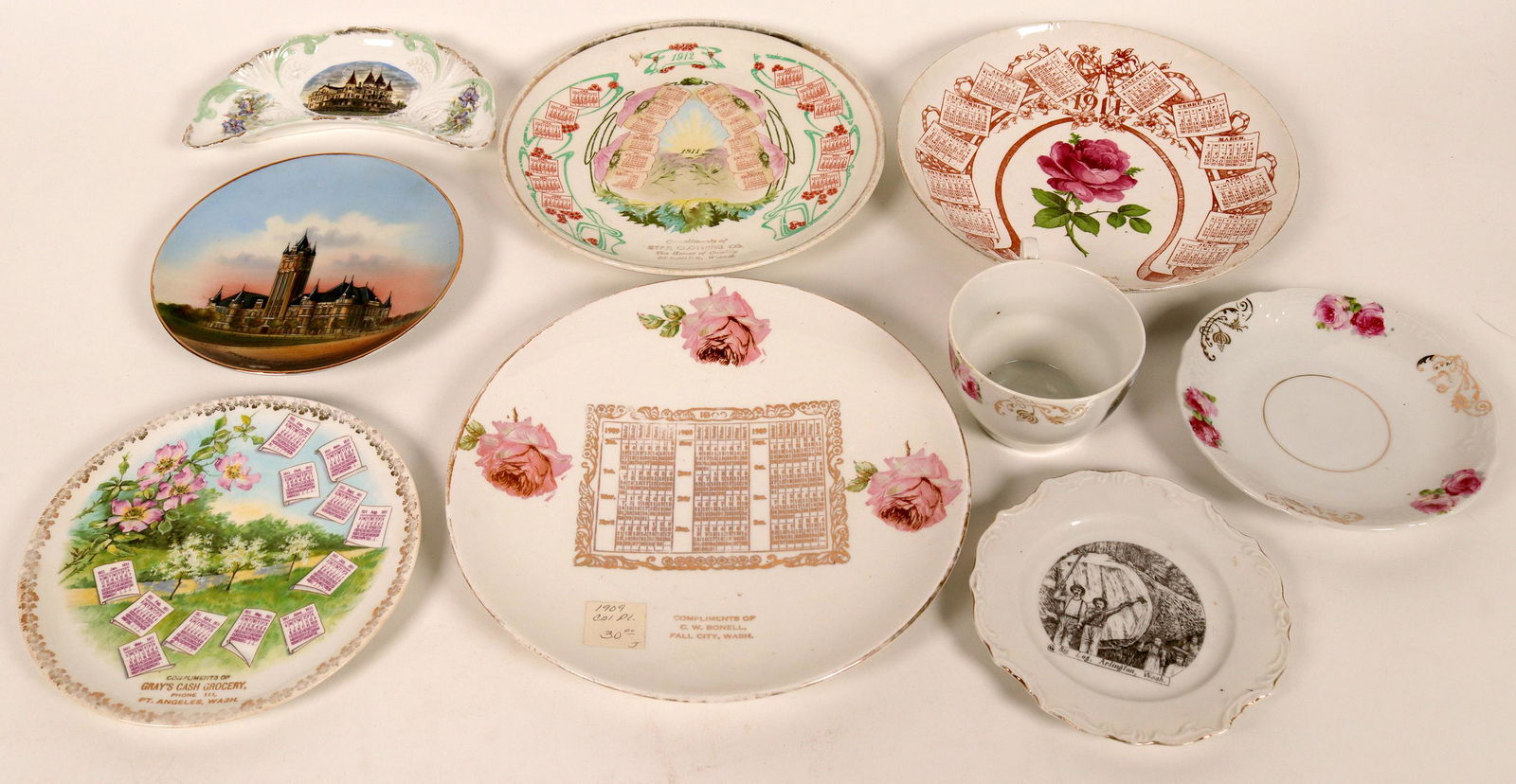 Washington Souvenir Advertising and Calendar Plates: Lot of 8. 1) Tea Cup. State Normal School, Bellingham, Wash. Bottom: Made in Germany. Diameter: about 2.5. Height: about 2.5. 2) Butter Dish. Hotel Monte Cristo, Everett, Wash. Reverse: Made in German