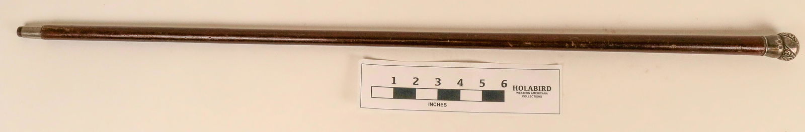 Sterling Knob Cane (122707): Sterling Silver walking cane is engraved with the initials "JR". It is 35 1/4 inch long. Average condition. No jeweler name.Date: Country if not USA: State: City: Provenance: