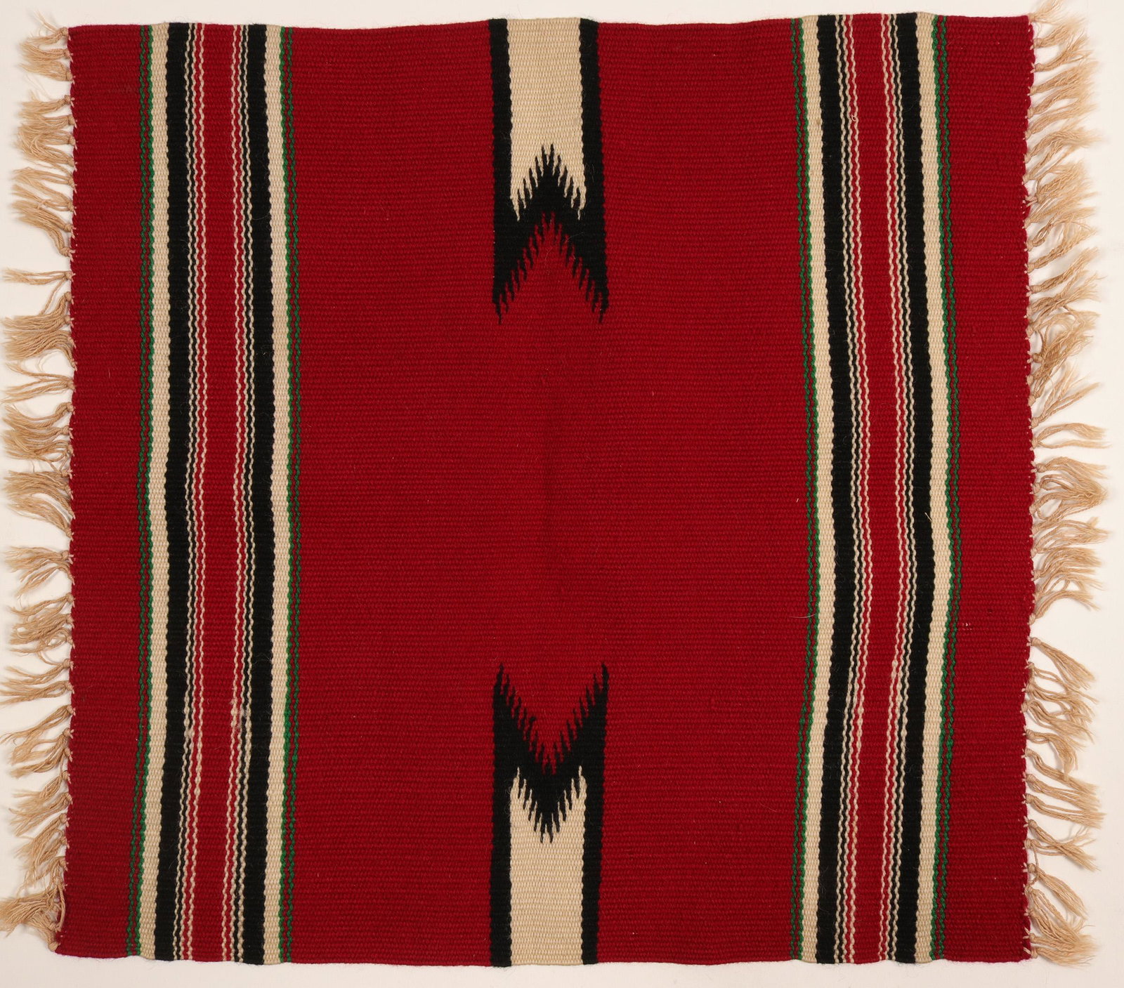 Rug / Mexican Table Runner (102130): Do you need something, bight and cheerful, for a side table ? Here it is . It is a small Mexican side table runner . Really nice condition, with bight vibrant colors. The overall color is Burgundy, wi