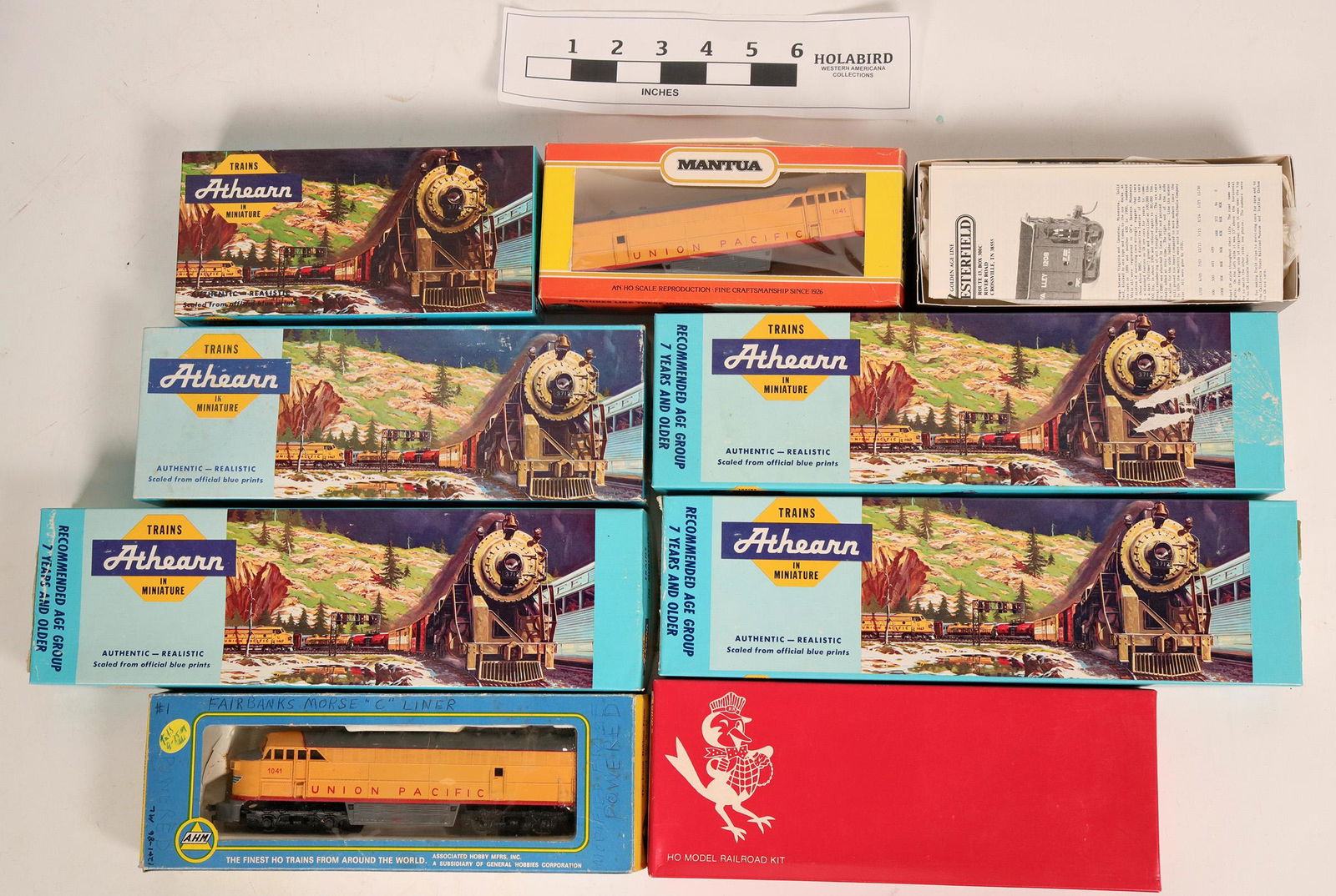 Model Train: Santa Fe, Union Pacific locoÃ­s and: Lot of 9. 1. AHM FM C-liner #1041, in box w/ extra body in superheated box. C-6. Bench tested: lights work and motor turn, not track tested. 2. Athearn Santa Fe SD-40 #5036 loco. Golf and Blue. Bench