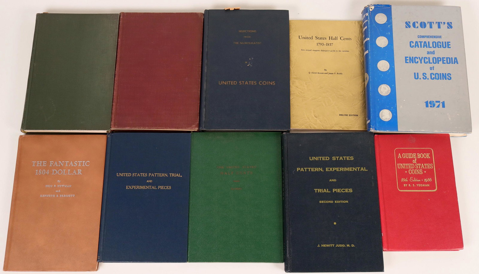 History and Values U.S. Coins Reference Books (118975): Lot of 10 reference books on the history and values of U.S. coins. Includes: "The Coin Collector's Journal," founded by John W. Scott in 1875, copyright 1934, Scott Stamp & Coin Co., Ltd., NY; "The St