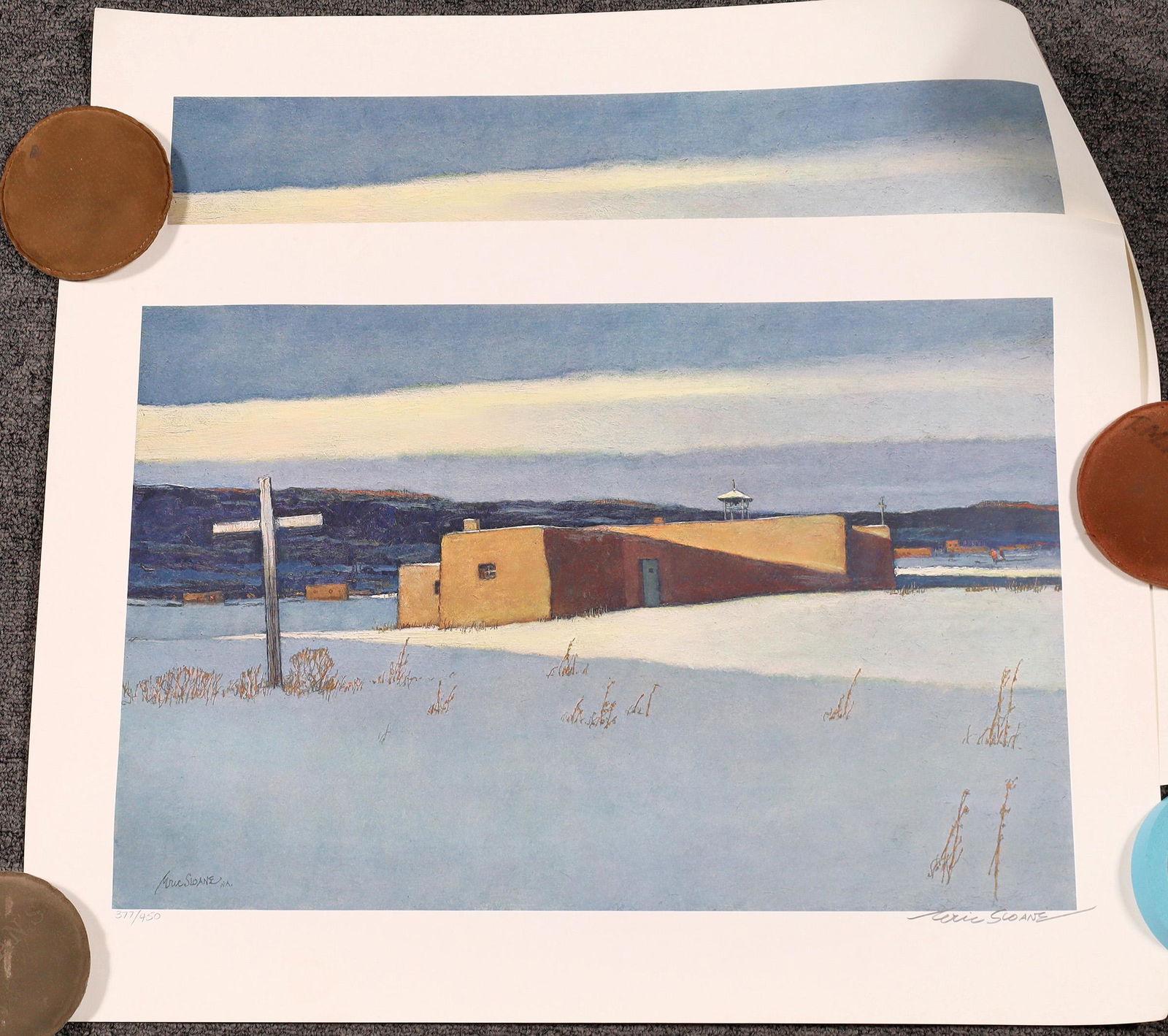 Eric Sloane Southwest Prints (122885): Two copies of a painting done and signed by artist Eric Sloane. Both are signed and numbered 381/450 and 377/450. They are of an adobe structure near Taos, New Mexico. Although a New York native, Sloa