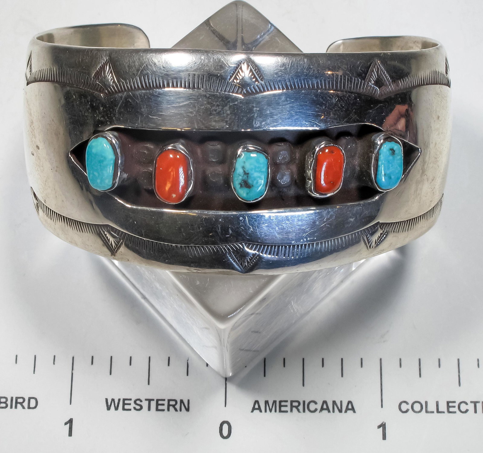 Turquoise and Coral Bracelet (125167): This is a nice vintage Navajo bracelet cuff set in a shadow box style with turquoise and coral stones, the band is about 1 [x=#188/][x=#8217/] in width, unsigned piece.Date: Country (if not USA): Stat