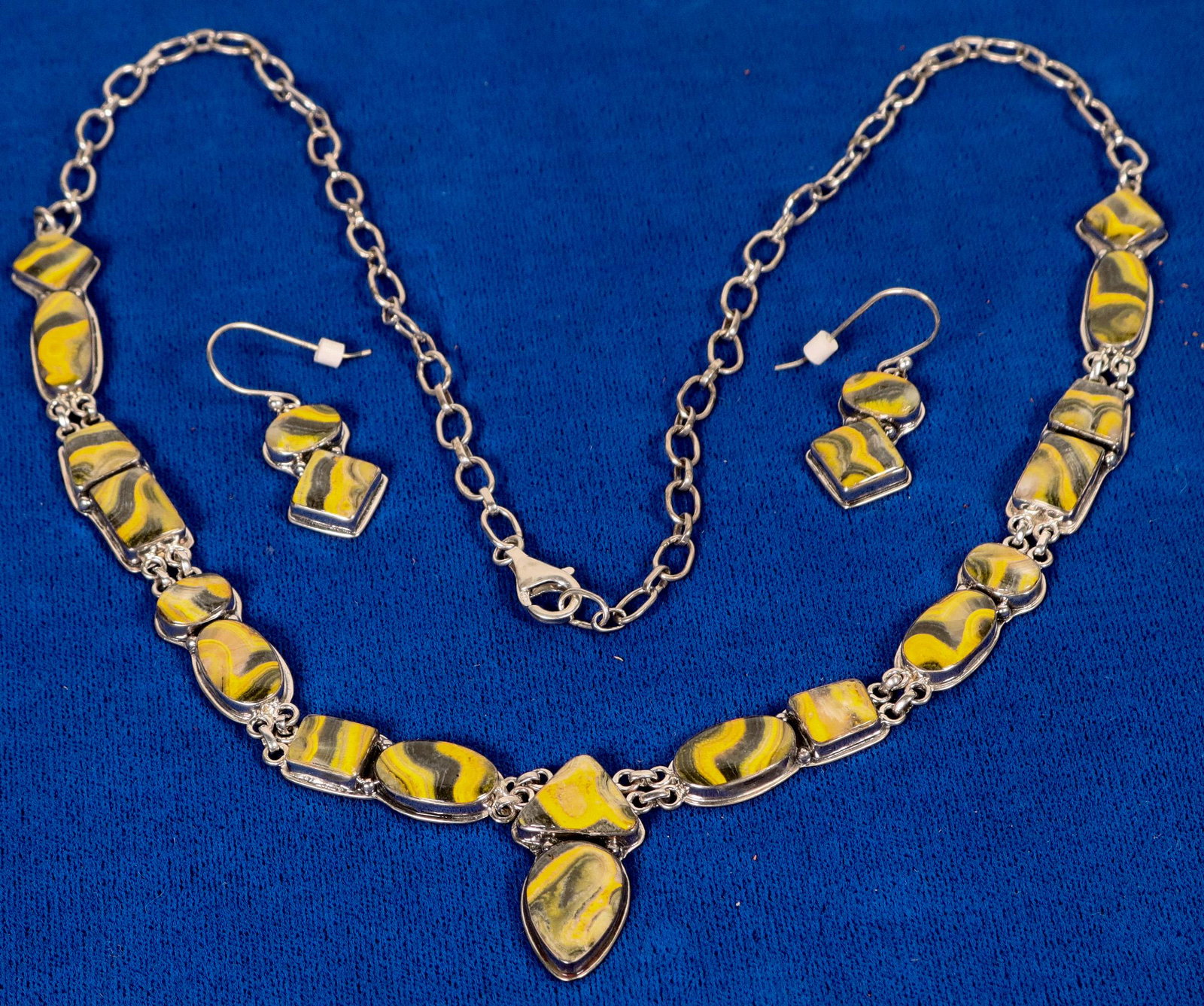 Bumble Bee Jasper Necklace Set (121995): Zuni made Bumble Bee Jasper necklace set, the necklace hangs at about 12[x=#8221/] top to bottom, both necklace and earrings are stamped MT.Date: Country (if not USA): State: City: Provenance: