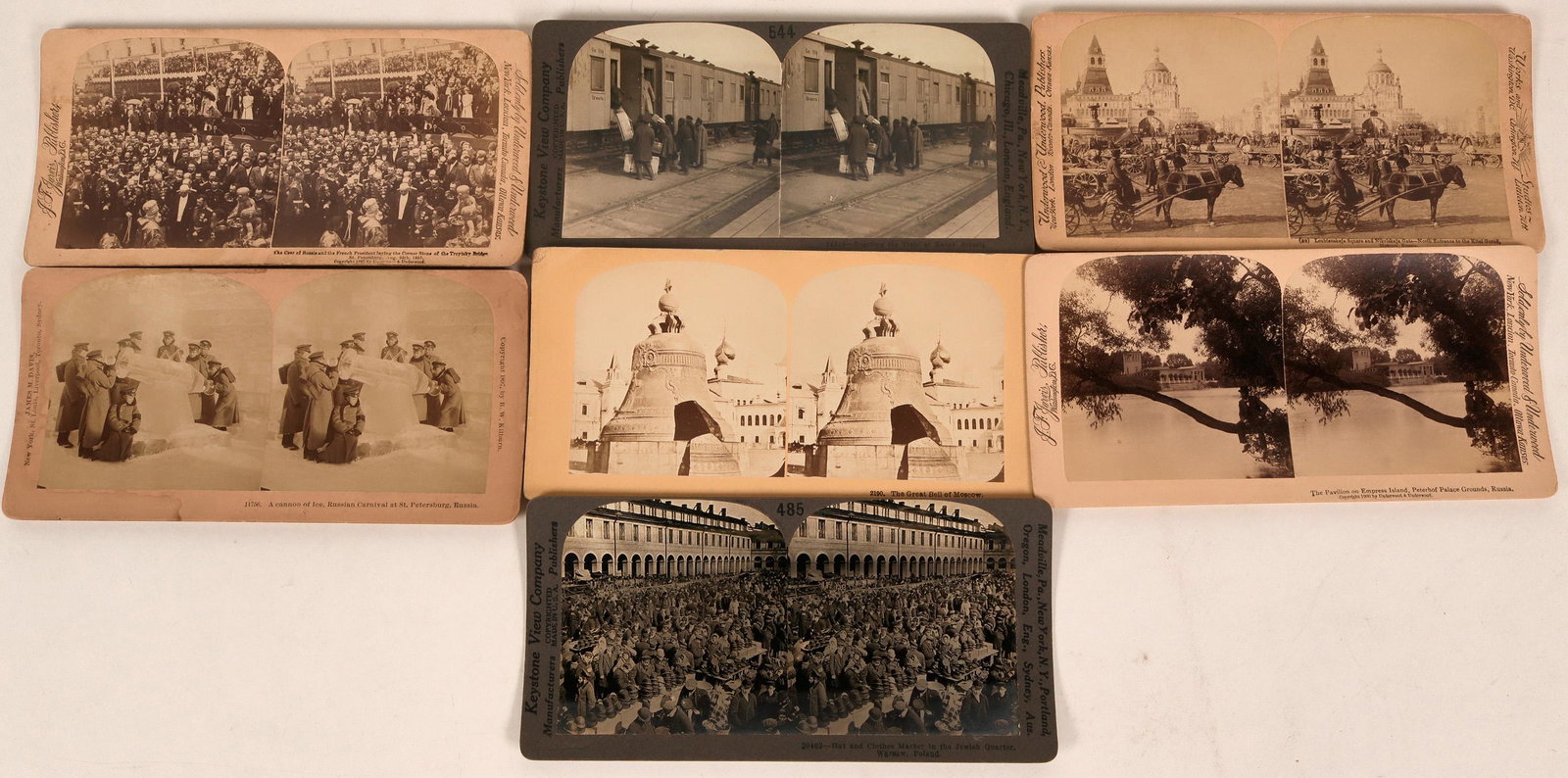 Russian Stereo-view Group (123212): Lot of seven. Great Bell of Moscow (Kilburn), cannon of ice (Davis), Peterhof Palace Grounds, Loublankskaja Square, train at Kansk Siberia and Russian Czar and French President laying corner stone of 