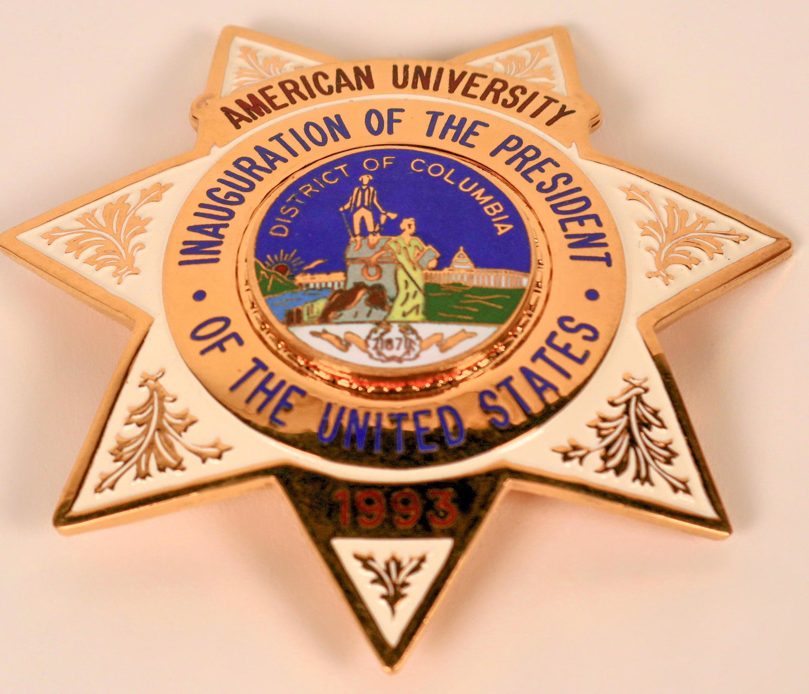 American University Inaugural Badge (121886): 1993, Bill Clinton, Presidential Inauguration badge by Blackinton.125[x=#8221/] solid brass, polished hi-glo and rhodium plate with multiple colors, and enamel background. Seven point star, top banner