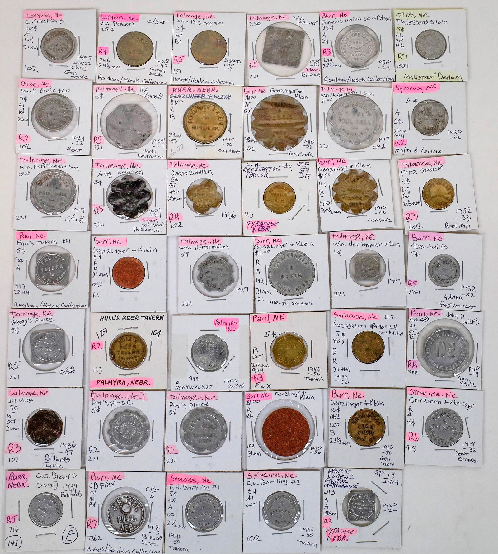 Otoe County Token Collection (121614): Lot of 41 tokens from Otoe County: Otoe (2): Thiessens Store; John F. Grafe & Co. Lorton (2): J.J. Paben; C. Steffens. Palmyra (2): Hull's Beer Tavern; Leppert & Mahoney. Paul (2): Fox; Paul's Tavern.