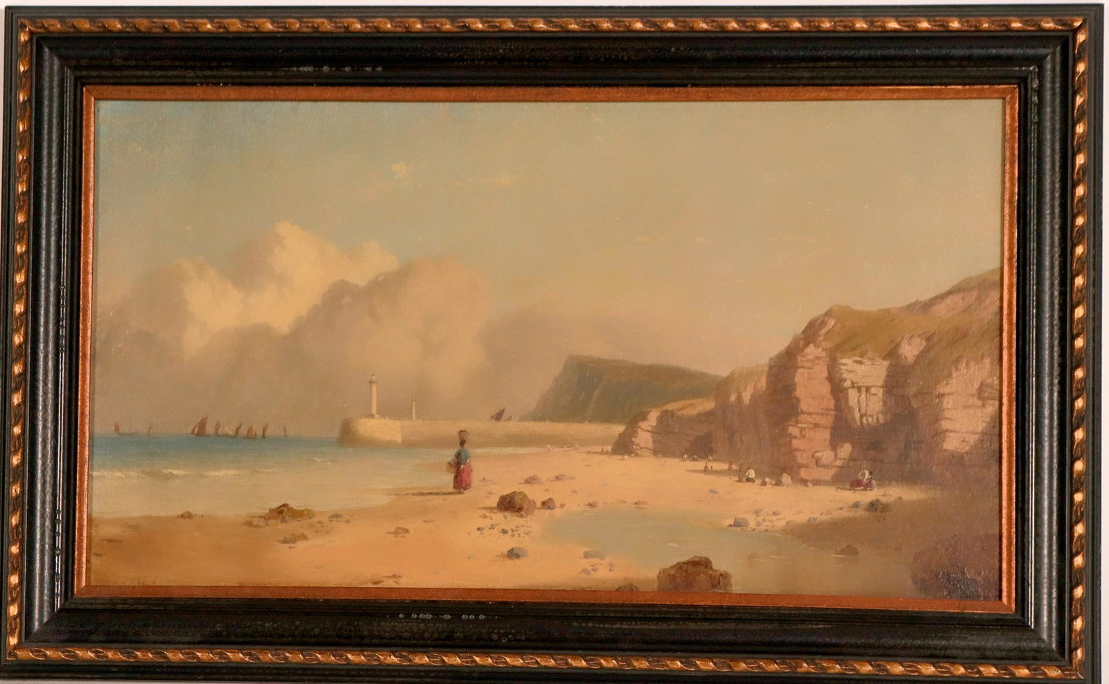 Woman Walking on Beach by Thomas Pyne (117707): Oil painting on board by thomas Pyne (1842-1935) Image of woman walking along beamc, basket on head, by cliffs, sail boats in sea. Signed T. Pyne, '67. He was a landscape painter in oil and watercolor