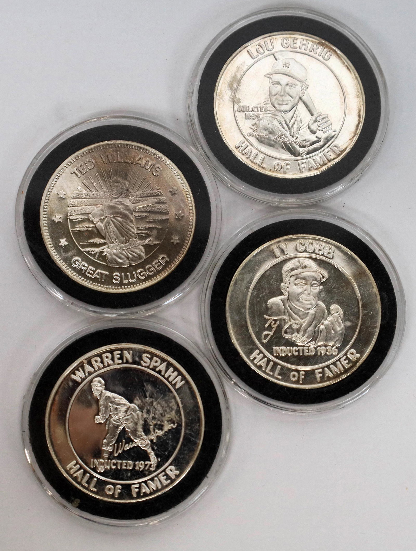Baseball Collectible Silver Rounds (124173): Lot of four silver rounds: Ty Cobb, Ted Williams, Warren Spahn and Lou Gehrig. Each one troy ounce .999 fine silver in protective plastic cases. Date: Country (if not USA): State: City: Provenance: