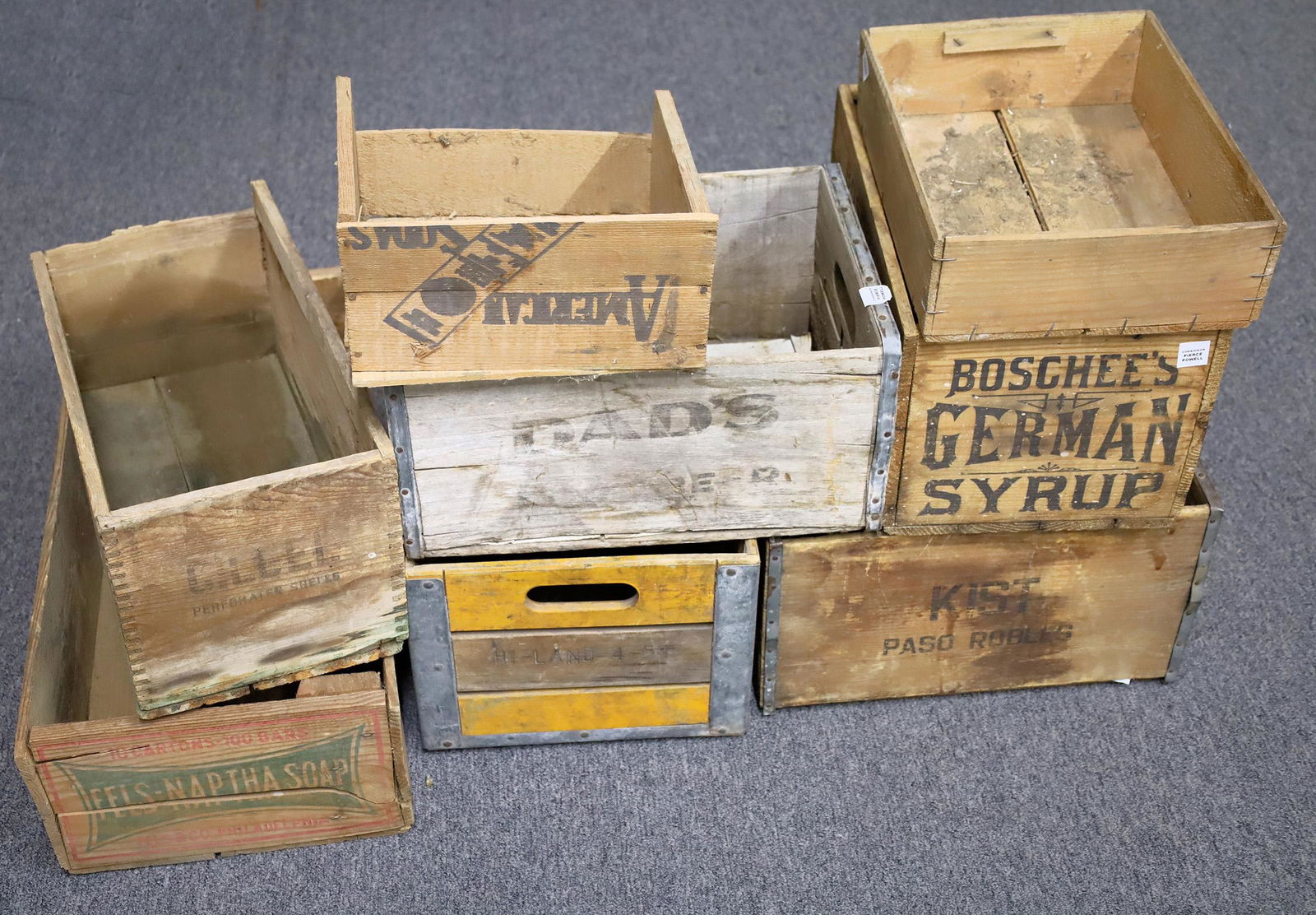 Old Wooden Crates (120957): Eight wood crates from various companies. Boxes include Fels-Naptha Soap, American Biscuit Company, Dame Rouge Wine, Boschee's German Syrup and a few more. The Boschee's is the money item here. The co