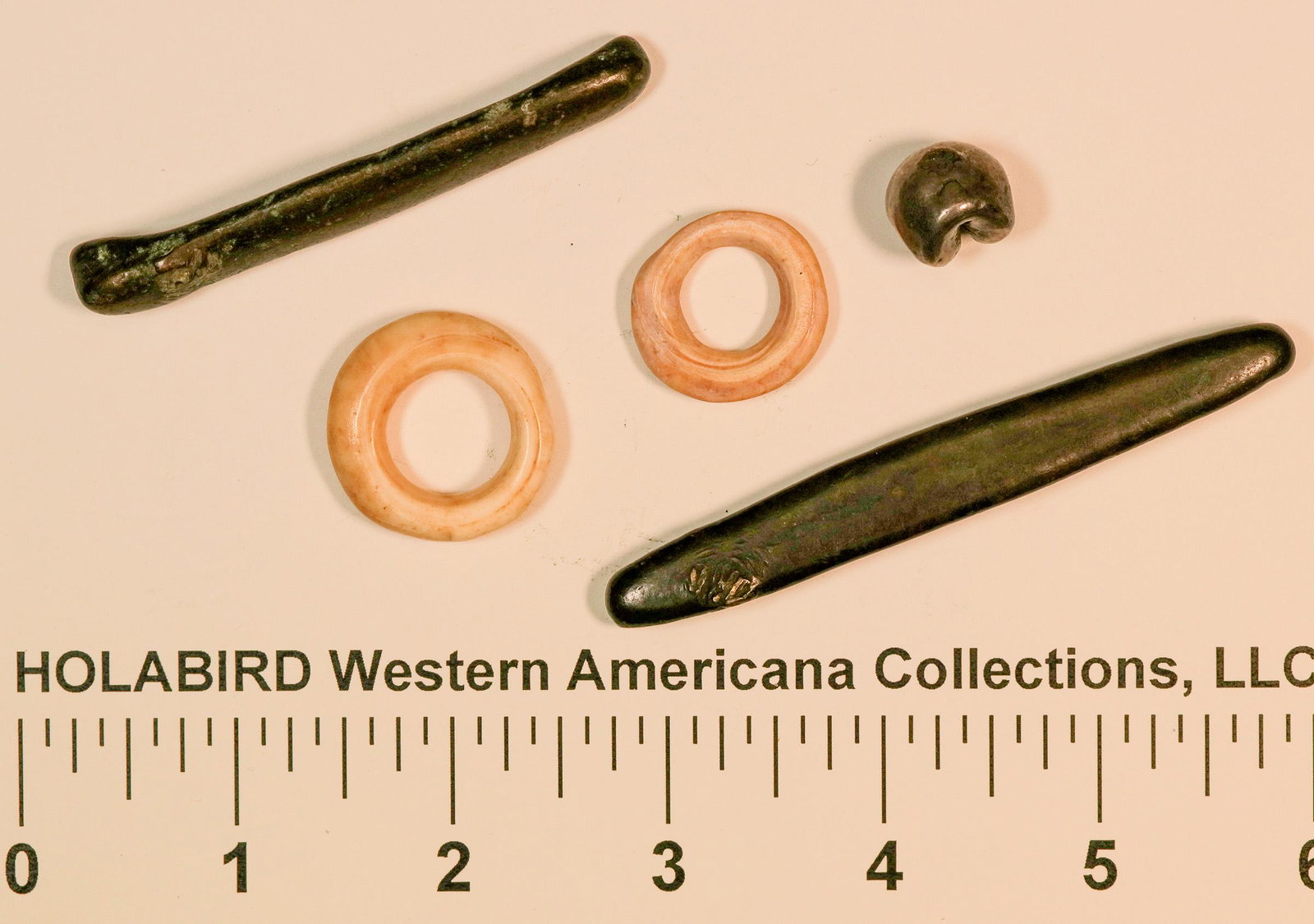Unusual Money (124412): Lot of five pieces of unusual money: 1 & 2) two Sumerian shell rings, ca 3000 BC, 20-25 mm; 3) Bullet Money from the Kingdom of Siam (Thailand) period of Rama IV 1851-1868 A. D, 4 & 5) two bronze bars