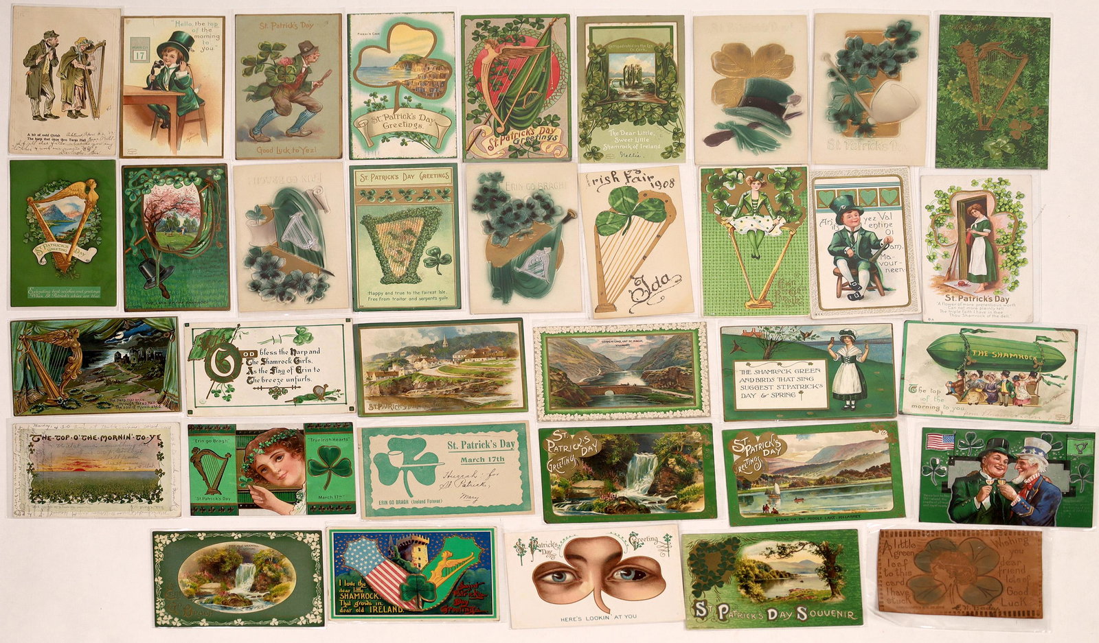 St. Patrick's Day Postcards ~35 (125868): Here are about 35 postcard themed for St Patrick's Day. Full of green and gold, harps, shamrocks, and leprechauns. Some have embossed relief. Buy this lot and Erin go Bragh!Date: Country (if not USA):
