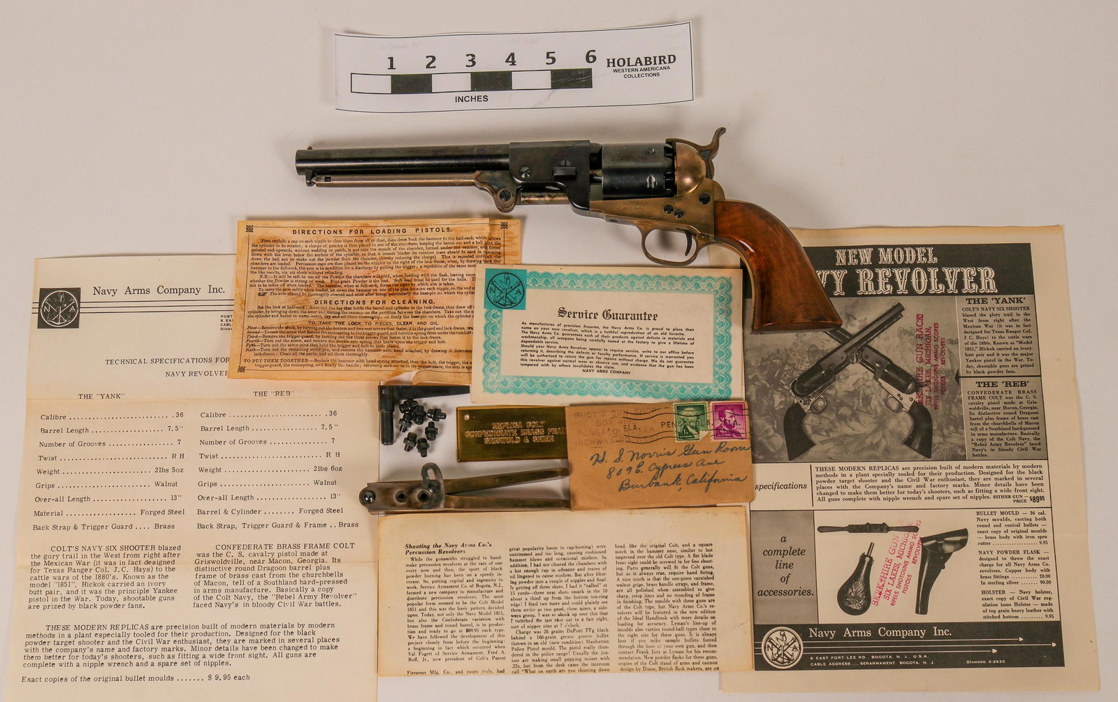 First Year Navy Arms 1851 Navy Revolver (120898): This is a Navy Arms 1851 Navy Colt made by Uberti. The revolver is a blackpowder cap & ball model in 36 caliber and its brass back strap and trigger guard tells you that it's a Confederate model, as t