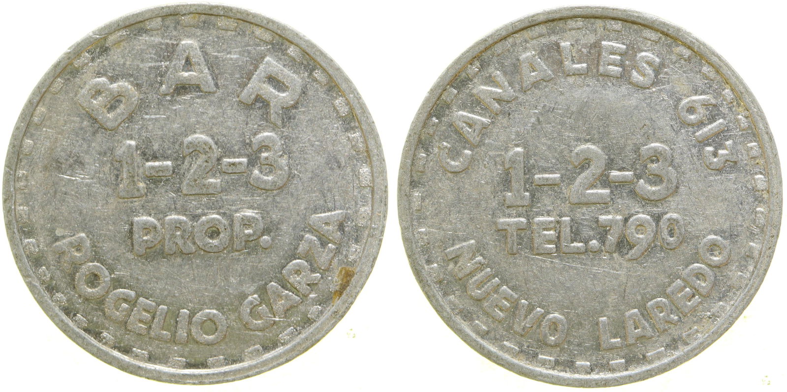 Bar 1-2-3 Brothel Token (104580): Obv.: Bar / 1-2-3 / Prop. / Rogelio Garza; Rev.: Canales 613 / 1-2-3 / Tel. 790 / Nuevo Laredo. wm, rd., 24 mm.Date: Country (if not USA): MexicoState: City: Nuevo LaredoProvenance: Roger Merritt Toke