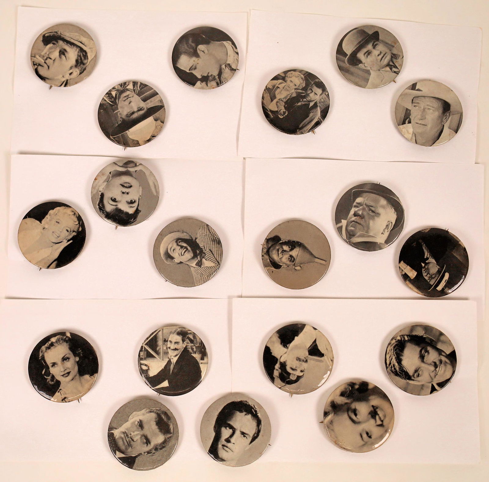 Movie Star Pin Backs (19) [127492]: Collection of 19 black and white pin backs (1.5") of famous actors and actresses of the Silver Screen. Included are Clark Gable, John Wayne, Marlon Brando, Edward G. Robinson, Victor MacLaglen and oth