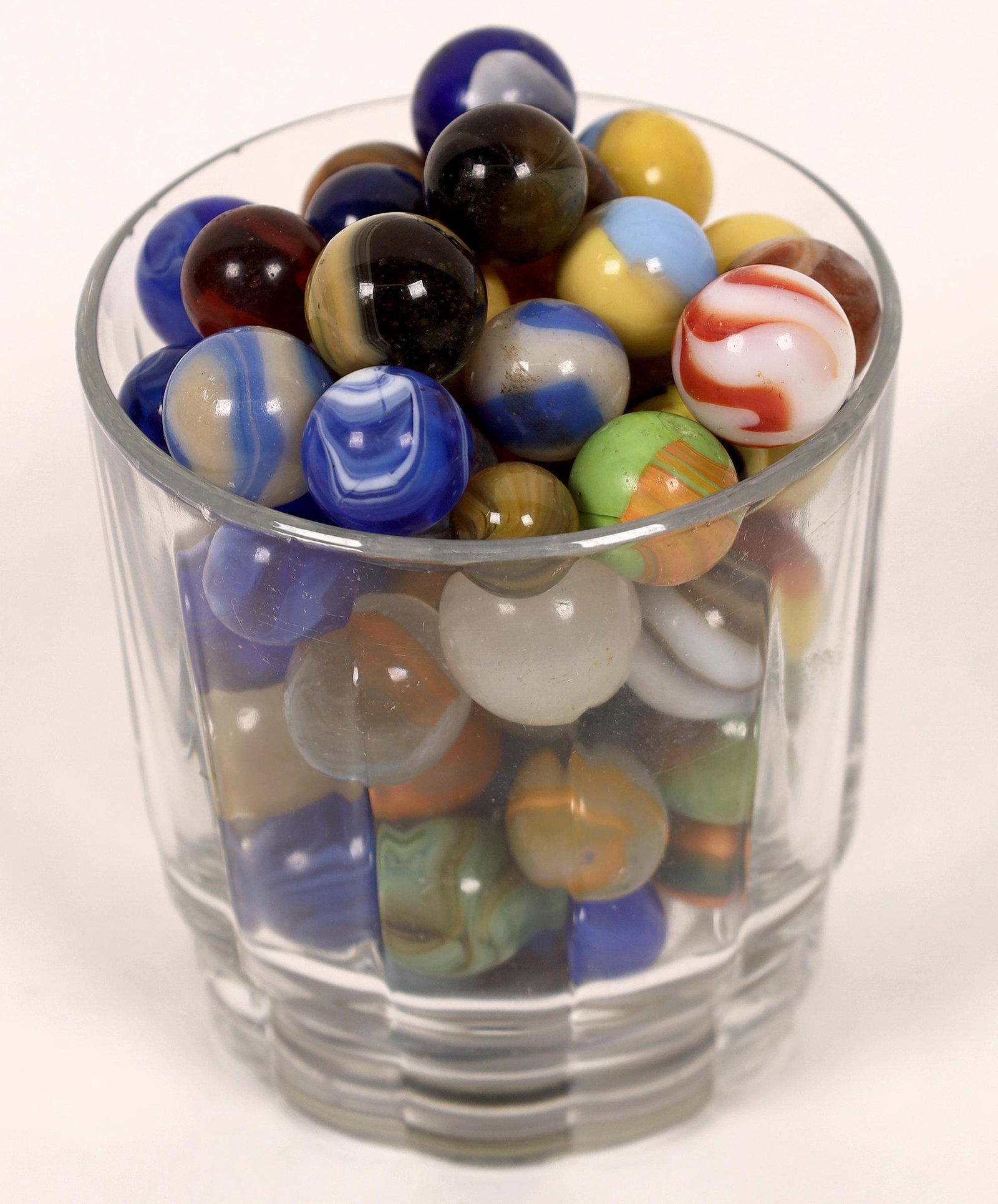 Machine made marble grab bag - (75) [127815]: Corkscrews, patches, slags and others that the names we don't know. Many have minor surface damage. A nice grouping of earlier machine made marbles.Date: Country (if not USA): State: City: Provenance: