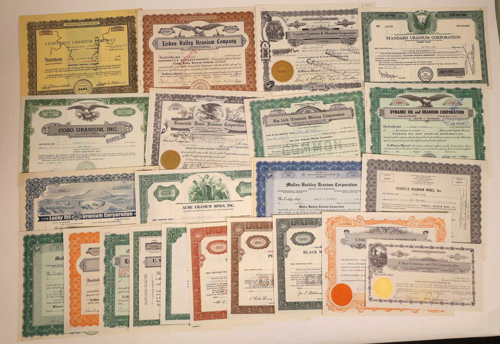 Uranium Mining Stock Certificate Collection [113896]: Lot of 22 different. These are mostly issued in the 1950s, an important era for uranium mining in the US. Following the atomic bombing of Japan in WWII, the demand for uranium for nuclear weapons dras