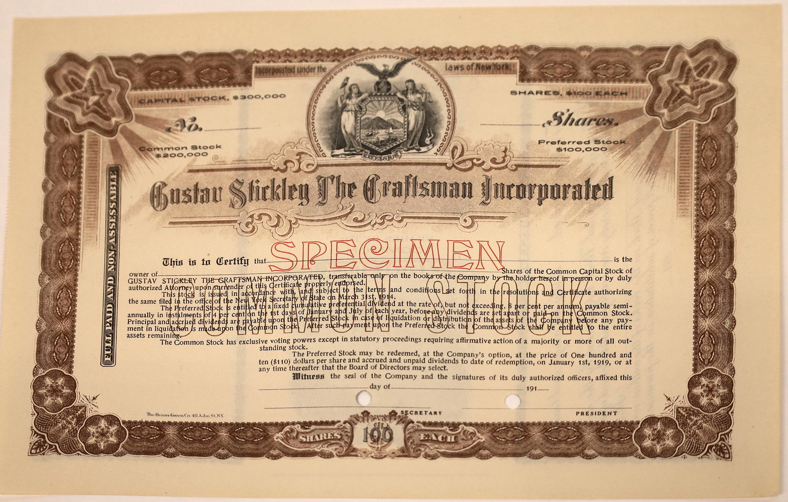Gustav Stickley The Craftsman Incorporated Stock: Specimen stock for this company that is one of the popular collectible furniture brands in the US. Brown border, black print, punch holes, and allegorical vignette. Printed by The Brown Green Co., NY.