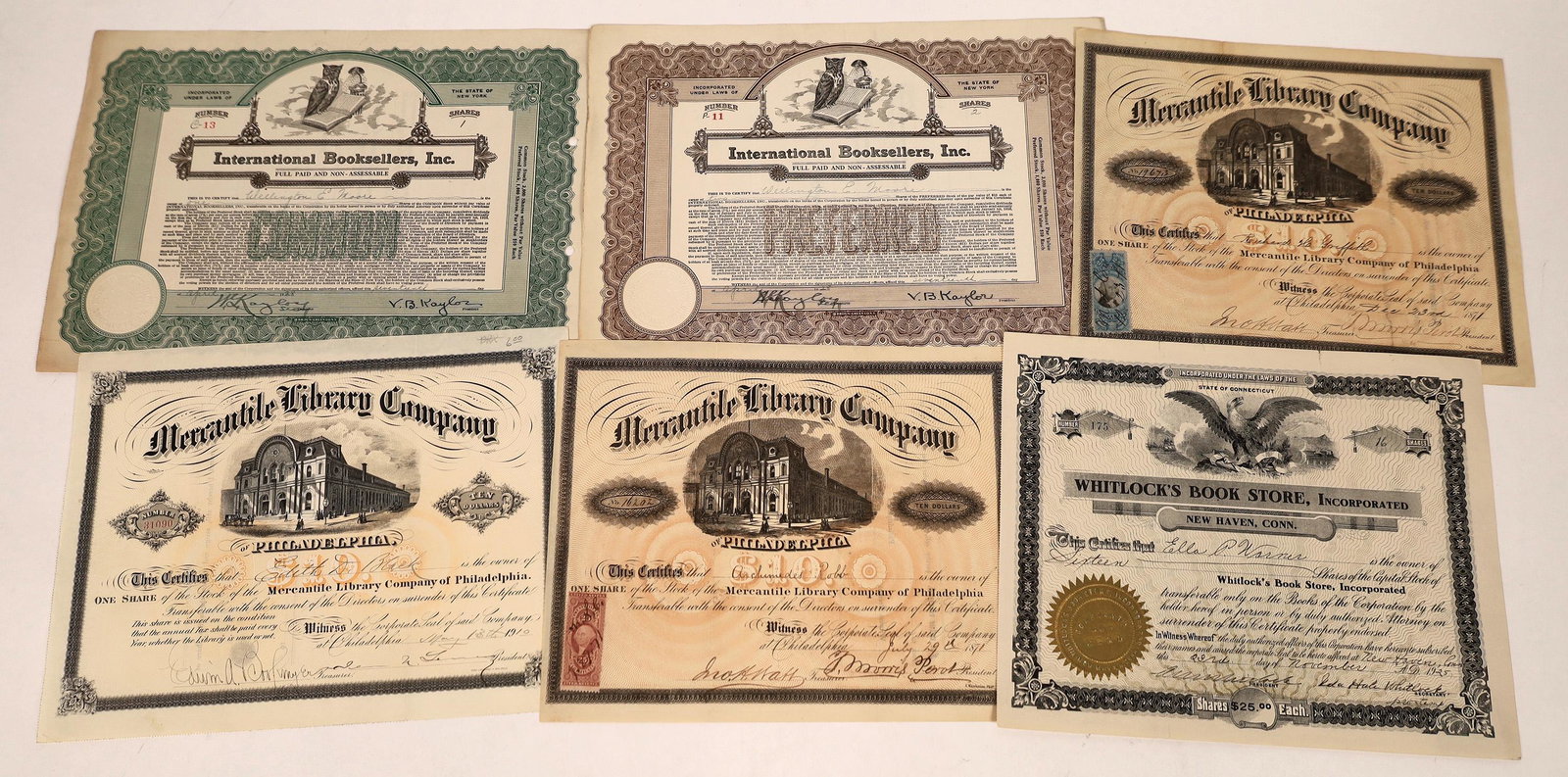 Booksellers and Library Co. Stocks [122437]: Lot of 6. 1. Three Mercantile Library Co., incorp. PA. I/U. Issued De. 1871. Black, [x=#8220/]$10[x=#8221/] brown under print. Vignette of library. 25c revenue stamp on two cents. . J. Haehnlen printe
