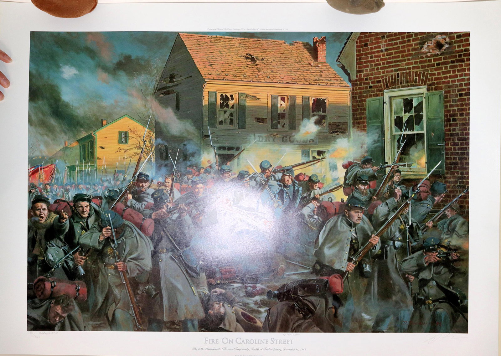 "Fire on Caroline Street" Signed, Numbered print by: Civil War historical artist Don Trioani signed print, 735/1300, 33.5 x 24.5". Battle of Fredricksburg, Dec. 11, 1862. Mint condition. Comes with a certificate discussing the battle written by A. Colin