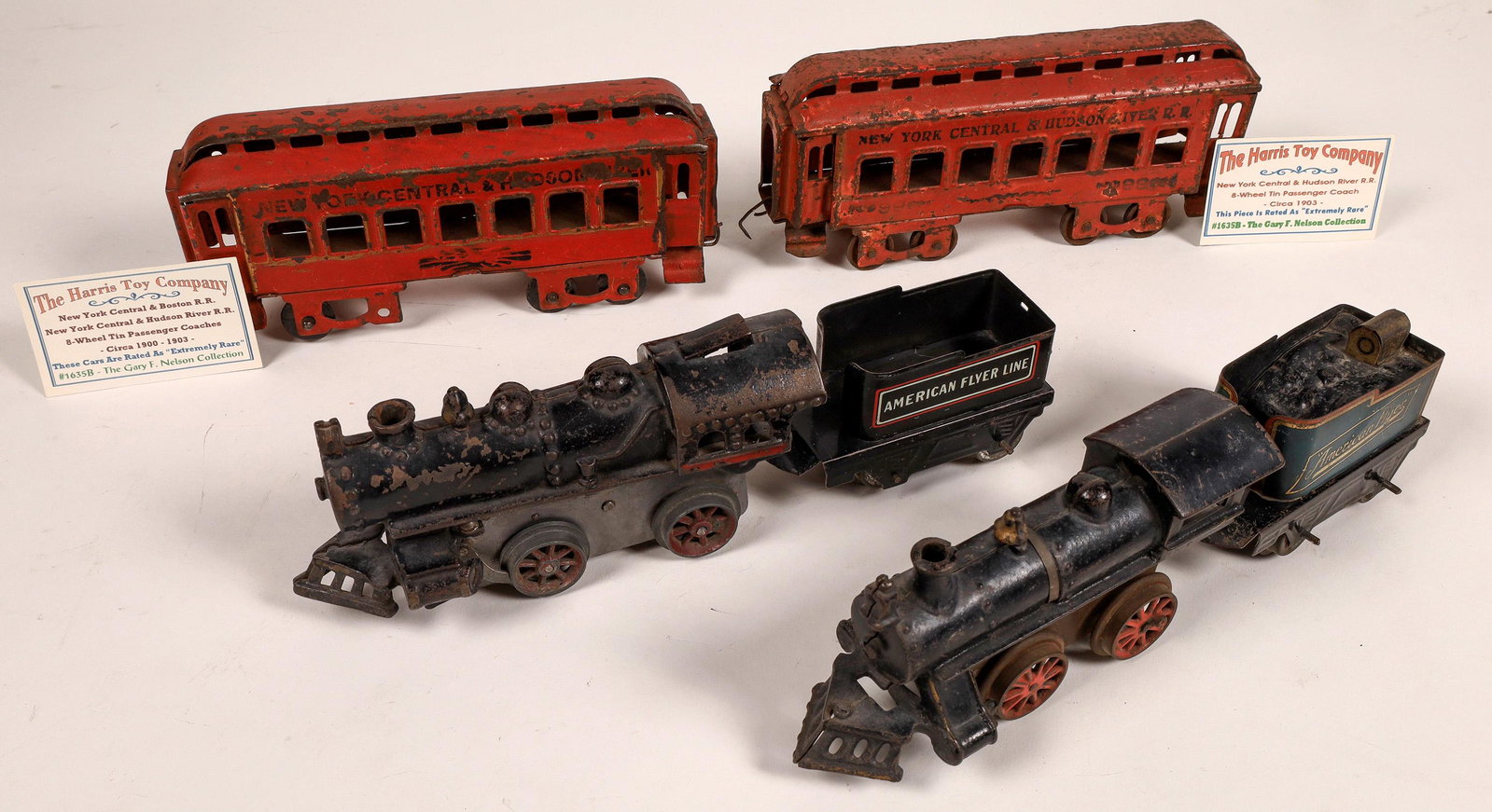 Cast Iron Locomotives with Tenders - 2 [133029]: 1. Locomotive 0-4-0 and Tender marked "American Flyer" 2. Locomotive 0-4-0 and Tender marked "American Flyer" with coal. Both engines are black; wind-up/push operable. 2 New York Central and Hudson Ri